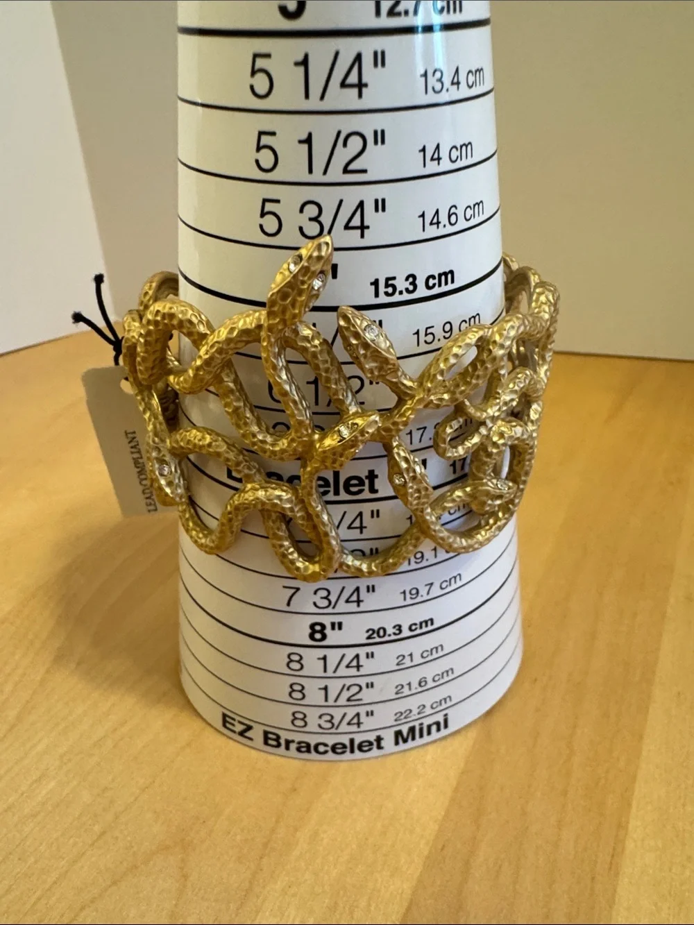 NWT textured gold tone entwined multi-snake clamper bracelet w/white crystal eye